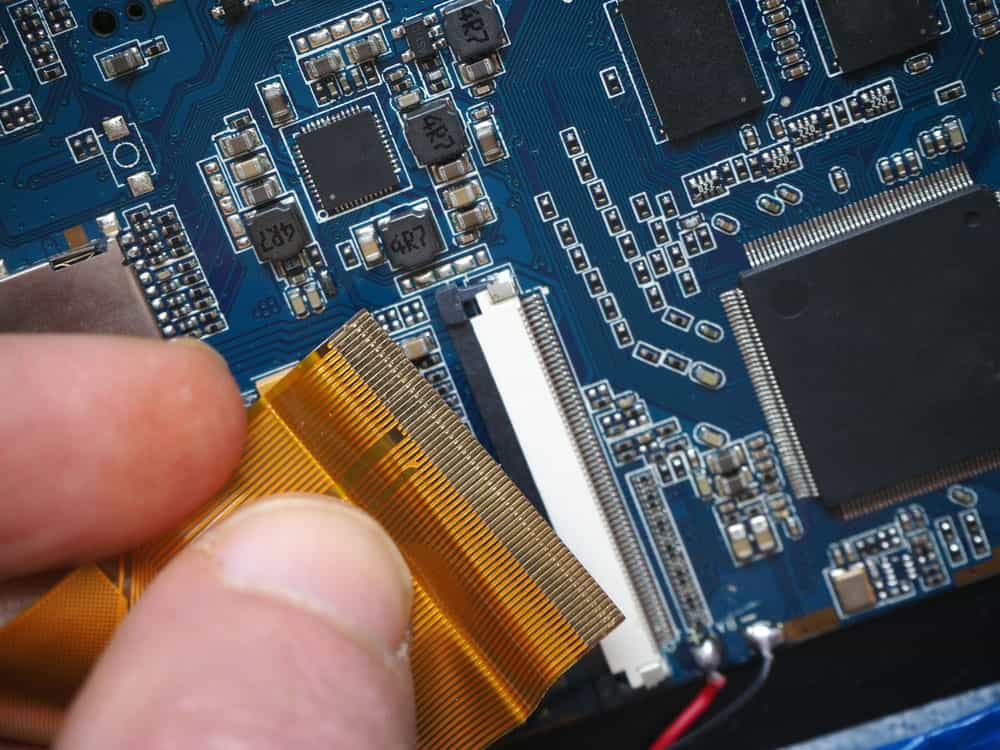 Installing a flex PCB cable into a motherboard socket
