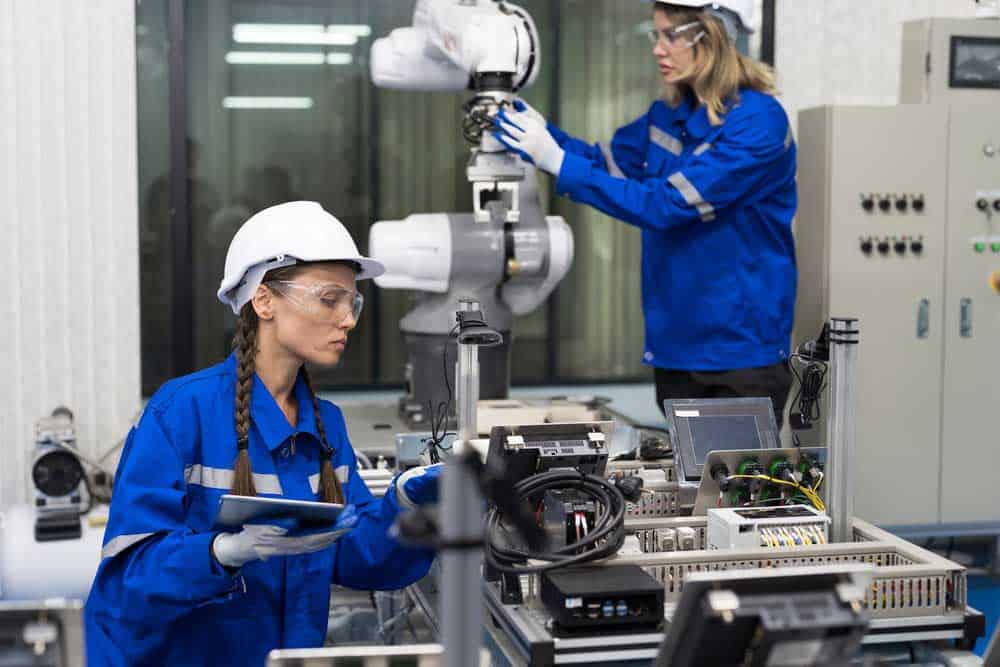 Female engineer working checking electronic circuits