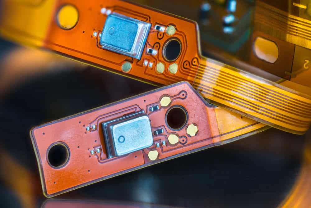A flex PCB with mounting holes