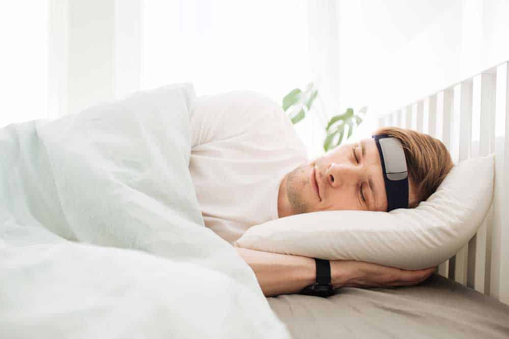 A man sleeping with a wearable device